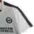 Camisa especial do Brighton para a Europa League tem degradê de branco para turquesa com imagem do Royal Pavilion. Detalhes pretos nas mangas e laterais, Swoosh preto da Nike, escudo em branco e preto.