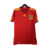 camisa titular da Espanha Adidas masculina 2010: Vermelho predominante, com detalhes em amarelo e friso azul nas mangas. Escudo da Espanha e logo Adidas bordados.