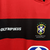 Camisa titular do Flamengo 2010 Olympikus: Camisa com listras rubro-negras, com detalhe na gola em preto. Símbolo de campeão da época no centro. Escudo do Flamengo e logo Olympikus bordados.