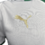 Manto reserva Palmeiras 2024: design igual ao titular, branco predominante, gola pólo e punhos verdes. Escudo no lado esquerdo, logo PUMA à direita.