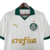 Manto reserva Palmeiras 2024: design igual ao titular, branco predominante, gola pólo e punhos verdes. Escudo no lado esquerdo, logo PUMA à direita.