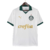 Manto reserva Palmeiras 2024: design igual ao titular, branco predominante, gola pólo e punhos verdes. Escudo no lado esquerdo, logo PUMA à direita.