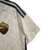 Camisa reserva da Roma 23/24 em cor creme com design de elementos arquitetônicos romanos. Detalhes em cinza carbono nas listras, escudo da Roma e logo Adidas bordados. Na nuca, destaque para a sigla 'ASR'.