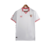 A camisa titular do Sevilla 23/24 é branca com jacquard inspirado no escudo e cerâmicas de Sevilha. Gola em V com detalhes vermelhos, escudo à esquerda e logo da Castore em vermelho à direita.