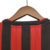 Camisa titular AC Milan 13/14 Adidas: tradicional vermelho e preto, com listras douradas nos ombros e friso vermelho na gola com bandeira da Itália. Escudo Milan e logo adidas bordados.