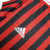 Camisa titular AC Milan 11/12 Adidas: tradicional rubro-negra, com detalhes em branco na gola, nos ombros e nas mangas. Na nuca, bandeiras de Itália e escrito Associazione Calcio Milan. Escudo e logo Adidas bordados.