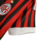 Camisa titular AC Milan 11/12 Adidas: tradicional rubro-negra, com detalhes em branco na gola, nos ombros e nas mangas. Na nuca, bandeiras de Itália e escrito Associazione Calcio Milan. Escudo e logo Adidas bordados.