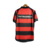 Camisa titular Flamengo 2003 Nike vista de costas. Rubro-negra com detalhes pretos nas laterais; mangas rubro-negras e gola redonda. Patrocínio Petrobras gravado em branco nas costas