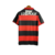 Camisa titular Flamengo 1992 Umbro vista de costas. Rubro-negra, com gola polo vermelha com detalhes pretos; manga com frisos detalhados em preto. Nome CR FLAMENGO gravado na gola em preto.