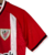 Kit Infantil Atlético de Bilbao I Castore 23/24 - Vermelho com detalhes em branco e preto