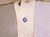 Camisa Polo Masculina Marfim com Logo em Metal e Botões Personalizados na internet