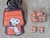 CONJUNTO GRAVATA / ADESIVO SNOOPY CASA C/15