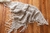 Chal foulard de lana de llama tejida a mano en telar de cintura. Textil artesanal del noroeste argentino. abrigo otoño invierno. Artesania textil tradicional de los pueblos andinos. 