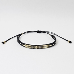 PULSERA CRUZ - NEGRO Y PELTRE