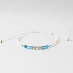 PULSERA CRUZ - BLANCO Y TIFFANY