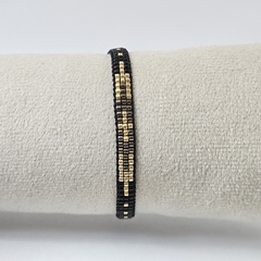 PULSERA CRUZ - NEGRO Y PELTRE - comprar online