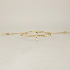 PULSERA UMA GOLD - CRISTAL CON DIJE ESTRELLA