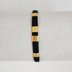 PULSERA TILA NEGRO Y DORADO (cordón negro)