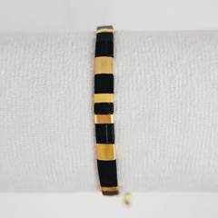 PULSERA TILA NEGRO Y DORADO (cordón dorado)