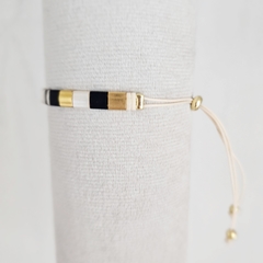 PULSERA TILA NATURAL, NEGRO Y DORADO - comprar online