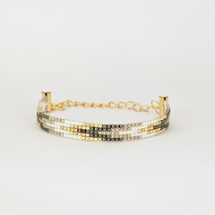 PULSERA NY - BLANCO, DORADO Y PELTRE