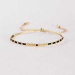 PULSERA UMA GOLD - NEGRO