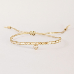 PULSERA UMA GOLD - CRISTAL CON DIJE CORAZON