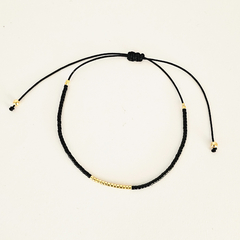 PULSERA FINI JAZMIN - NEGRO Y DORADO