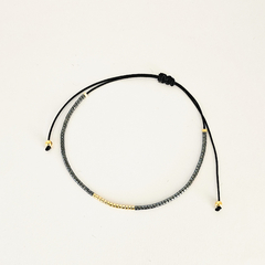 PULSERA FINI JAZMIN - METAL OSCURO Y DORADO