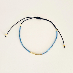 PULSERA FINI JAZMIN - CELESTE Y DORADO