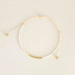 PULSERA FINI JAZMIN - NATURAL Y DORADO