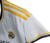 Camisa Titular Real Madrid, Temporada 2023/2024, Branca, Gola em V, Azul Marinho, Branco, Dourado, Escudo do Real Madrid, Logo Adidas, ¡Hala Madrid!, Futebol, Moda Esportiva , feminina, home, 1 , torcedor , adidas , emirates fly better ,3 png 