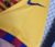 camisa - barcelona - fourth - amarela - amarelo - vermelha -torcedor - nike - 23/24 - masculina - spotfiy - punho quadriculado em vermelho e azul - gola - arredondada - escudo - bordado - 4 png .  