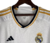 camisa - manga - longa - real madrid - home - 1 - branca - amarelo - azul marinho - escudo - bordado - adidas - torcedor - escudo - bordado - 23/24 - gola - v - emirates fly better - hala  madrid -3  png .