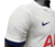 camisa - tottenham - home- 1- jogador- branca- nike - aia- escudo- emborrachado- masculina- 23/24- gola - arredondada- azul marinho -4 png . 