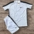 Conjunto Nike Dry-Fit masculino em cores variadas, composto por camiseta branca com detalhes em preto e short branco, ambos com o logo da Nike.