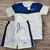 Conjunto masculino Nike Dry-Fit com camiseta branca e azul e short branco.