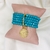 Kit de pulseiras verdes com medalha Pai Nosso