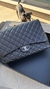 CHANEL Double Flap Maxi Lambskin na internet