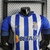 Camisa FC Porto Home 22/23 Jogador New Balance Masculina - Azul e Branco na internet