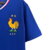 Camisa de futebol masculina da Nike, modelo Torcedor, na cor azul, com detalhes em vermelho e branco, estampada com o logo da seleção francesa.