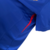 Camisa de futebol masculina da Nike, modelo Torcedor, na cor azul, com detalhes em vermelho e branco, estampada com o logo da seleção francesa.