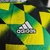 Imagen de Camisa Arsenal Pré-Jogo 22/23 Jogador Adidas Masculina - Amarelo, preto e verde.