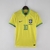 Camisa amarela do Brasil, modelo 2022, da Nike para torcedores masculinos, com detalhes em azul e verde.