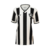 Camisa feminina do Botafogo, modelo 24/25, nas cores branca e preta, com listras verticais e logo do clube.