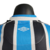 camisa-gremio-I-23/24-jogador-azul-preta-branca-umbro-4