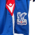 Kit Infantil Crystal Palace I Macron 23/24 - Vermelho e azul com detalhes em branco en internet