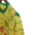 camisa-nantes-especial-comemorativa-80-anos-2023-23-amarela-verde-macron-8