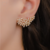 Brinco earcuff com zircônias