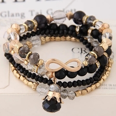 4 Pulseras de Cuentas de Cristal Simples en Tono Negro y Detalles Dorados